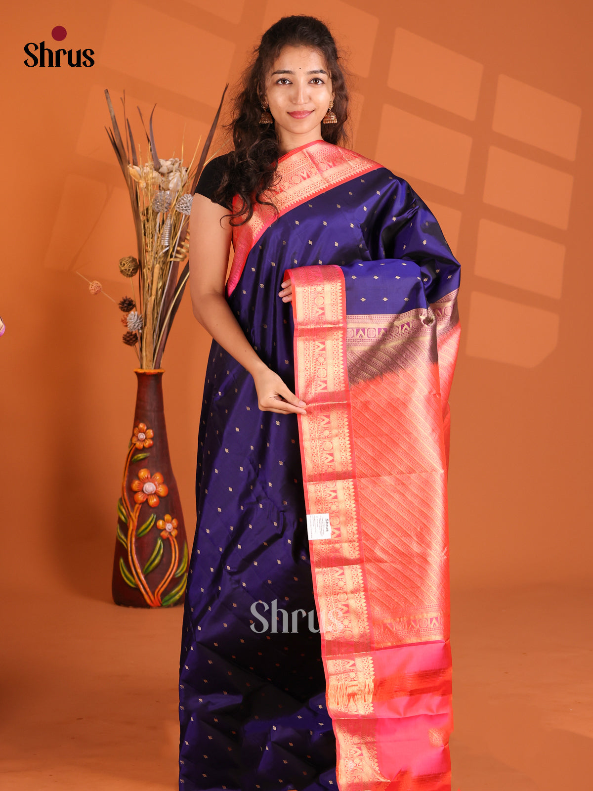 Royal blue Kanchipuram silk Saree with contrast Orangish Pink border