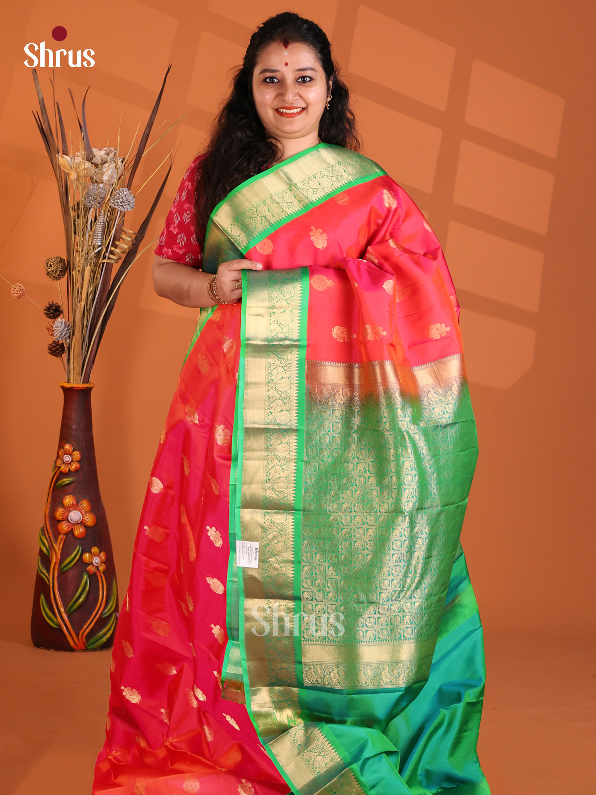 Shimmery Orangish Pink Kanchipuram silk Saree with peacock vines border-1