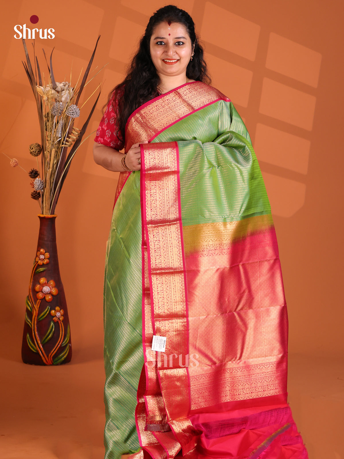 Charming Pista green & Kanchipuram silk Saree with rich traditional zari border-1