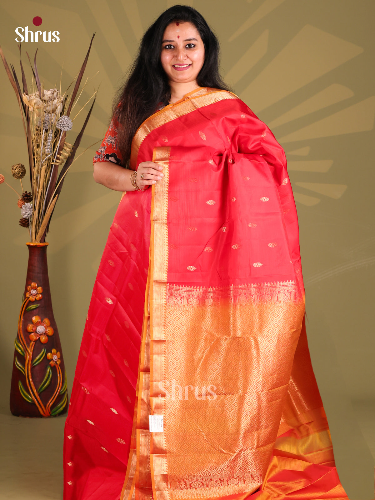 Charming Red Kanchipuram silk Saree with gold zari floral buttas