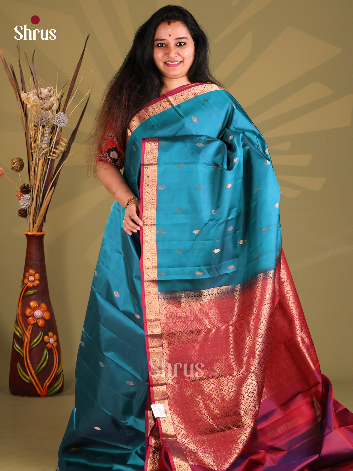 Blue & Maroon Kanchipuram silk Saree with floral buttas border