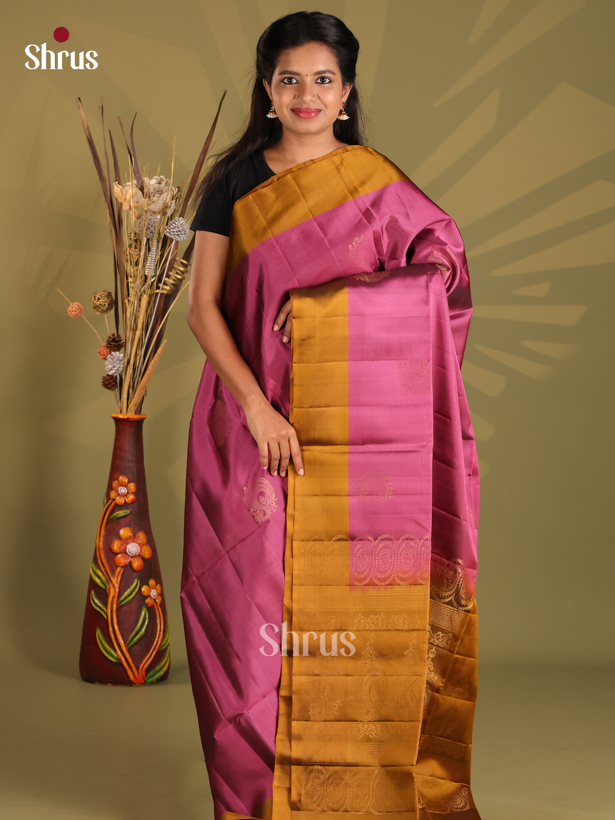 Beautiful Purple Softsilk-halfpure Saree gleams with gold zari motifs
