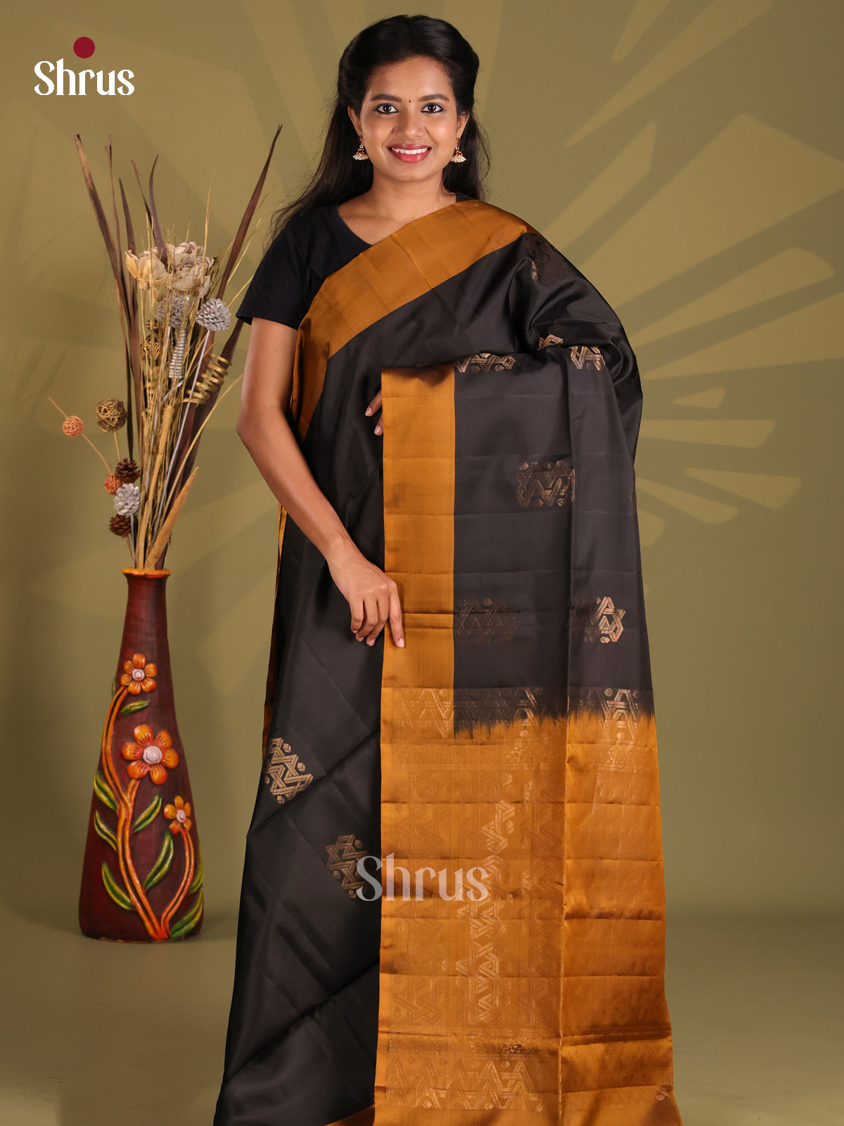 Pretty Black Soft silk-halfpure Saree with gold zari motifs