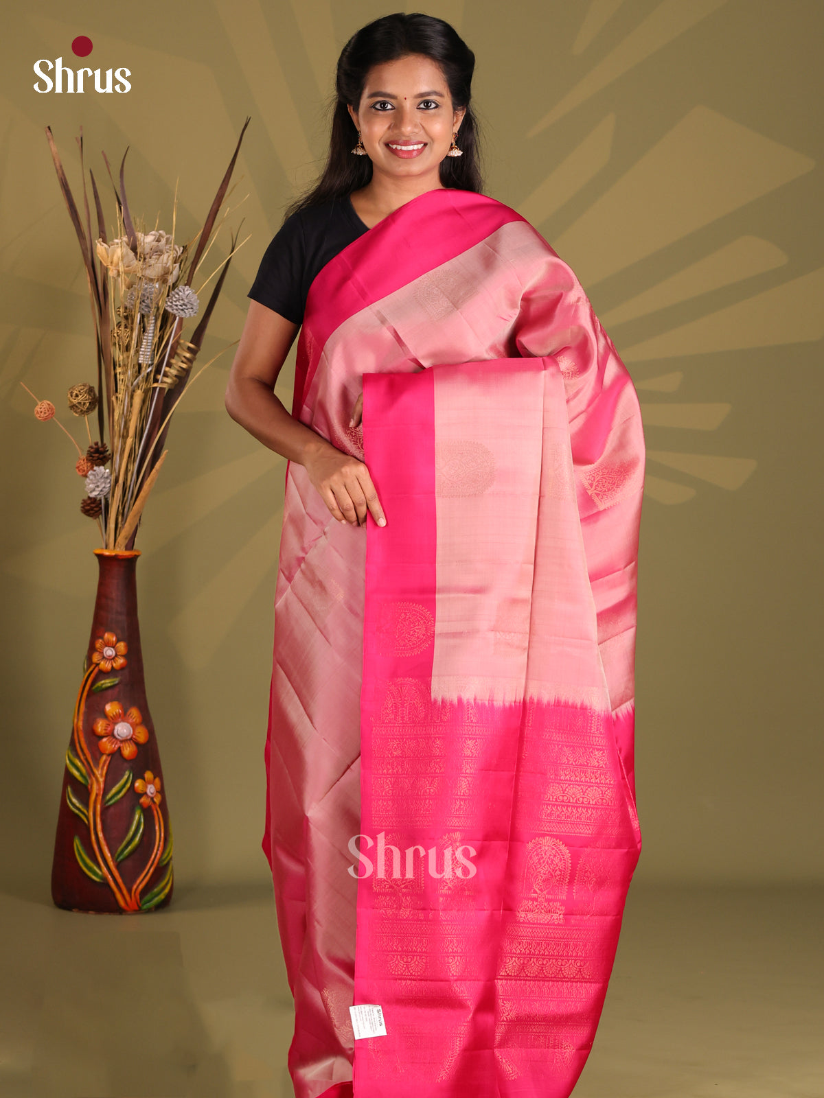 Charming dusty Pink Softsilk-halfpure Saree with zari motifs