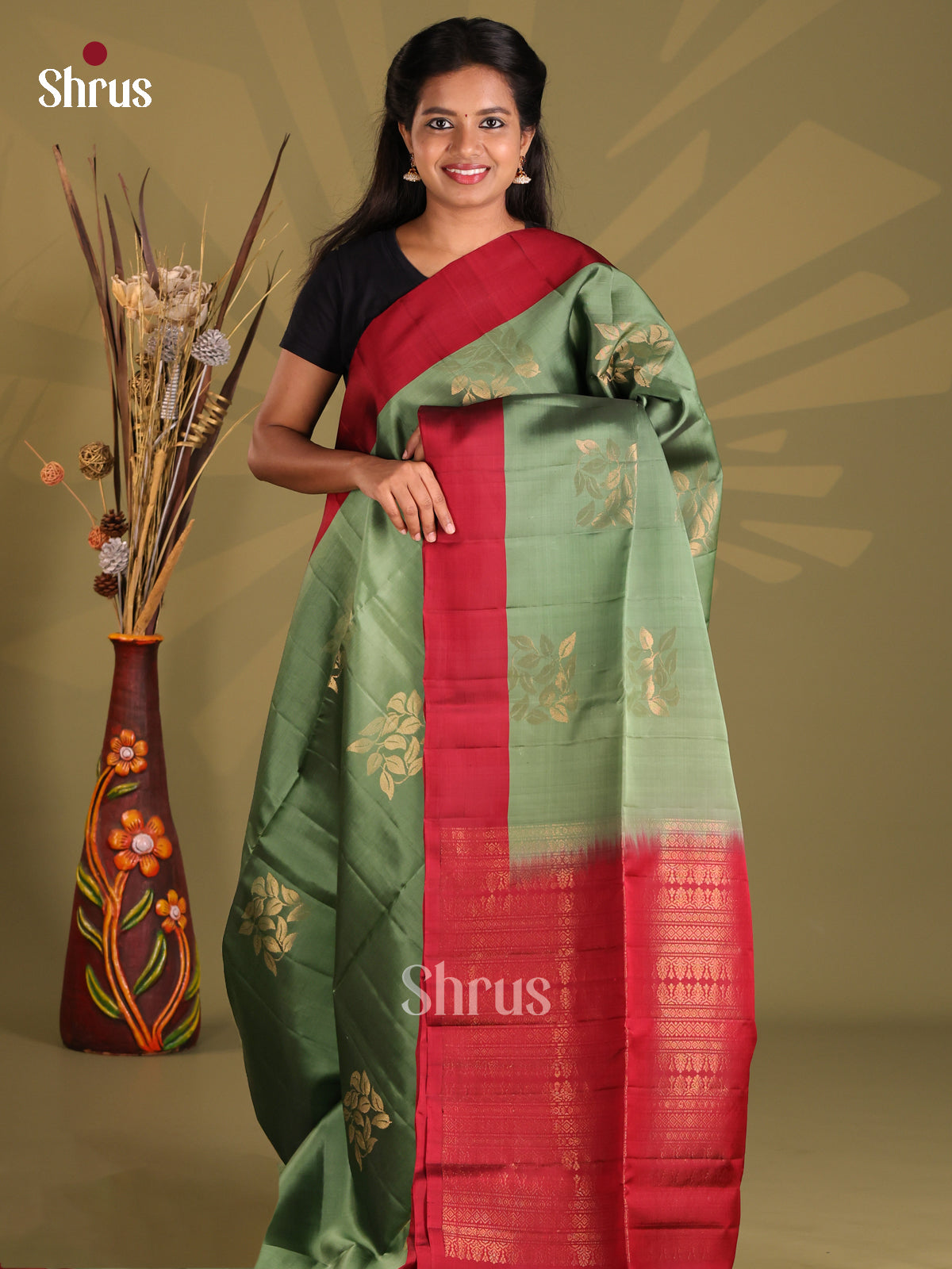Green & Maroon Softsilk-halfpure Saree with gold zari leaf motifs