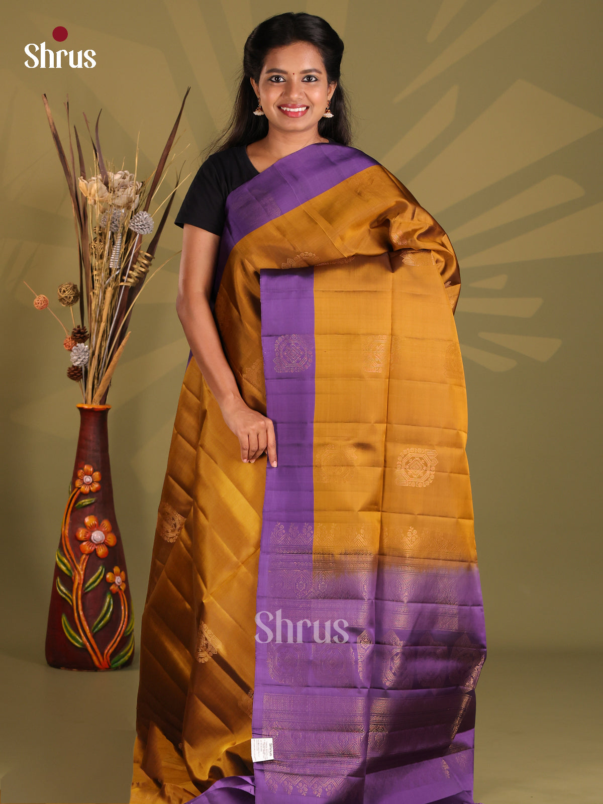 Lustrous Mustard Softsilk-halfpure Saree with zari floral motifs