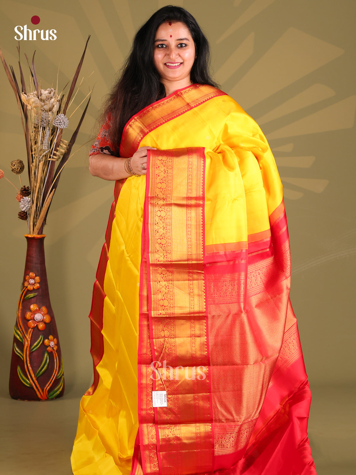 Luminous Yellow Kanchipuram silk Saree with rich Red Zari Border-1