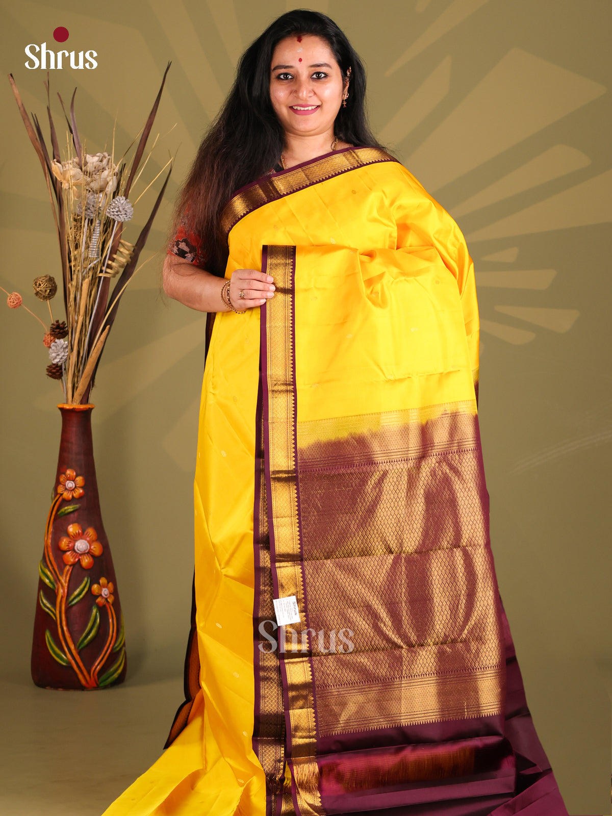 Glorious Yellow Kanchipuram silk Saree gleams with zari brocade pallu-1