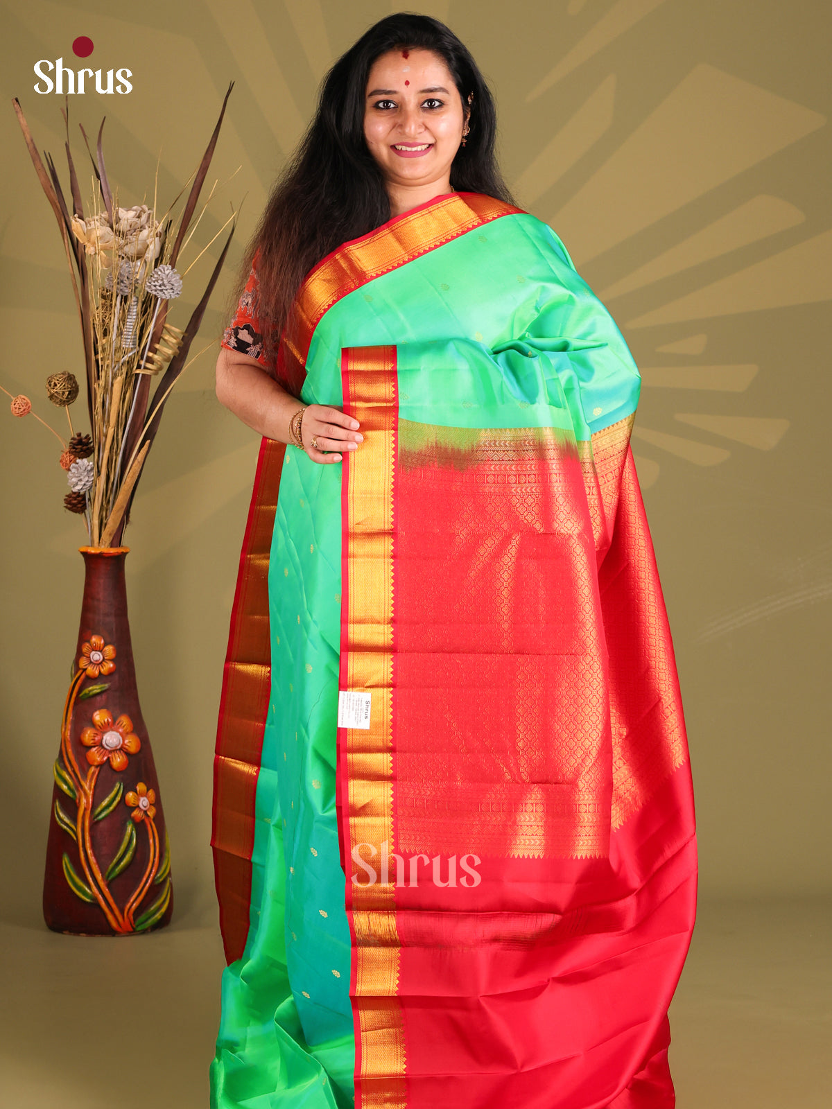 Teal & Red Kanchipuram silk Saree gleams with zari buttas , contrast border-1