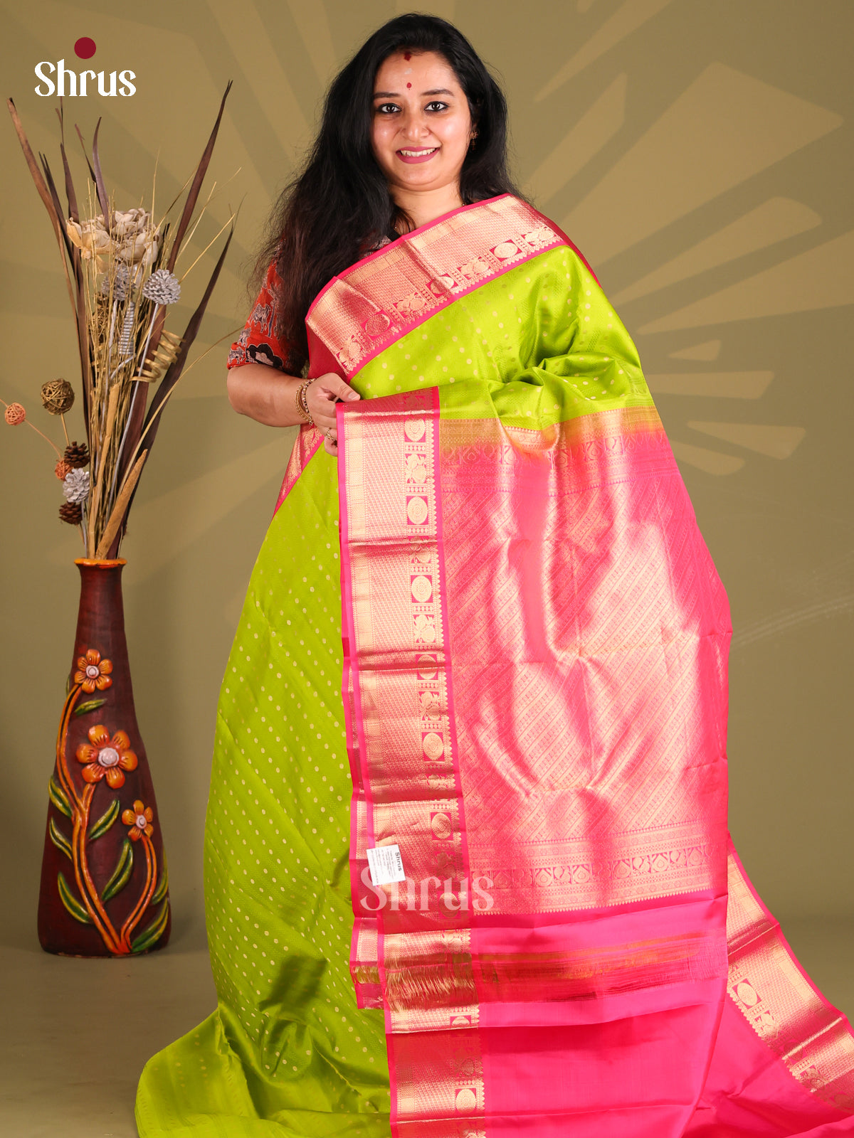 Vibrant Light Green Kanchipuram silk Saree with contrast rich zari border-1