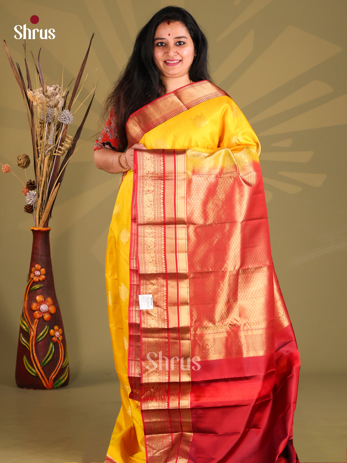 Lustrous Yellow & Maroon Kanchipuram silk Saree with peacock buttas zari border-1