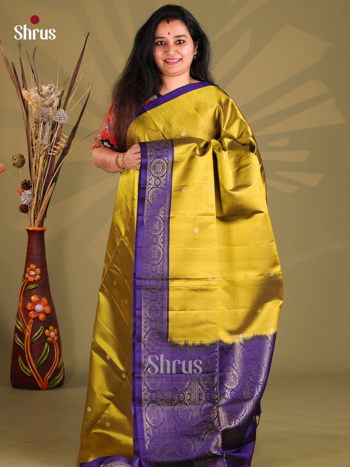 Mathulir Green Soft Silk Saree with contrast rich floral vine border