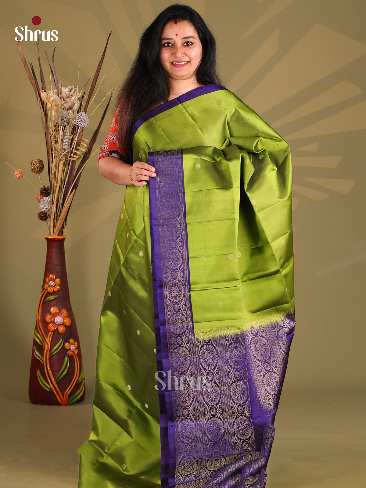 Exquisite Green Soft Silk Saree with contrast rich border
