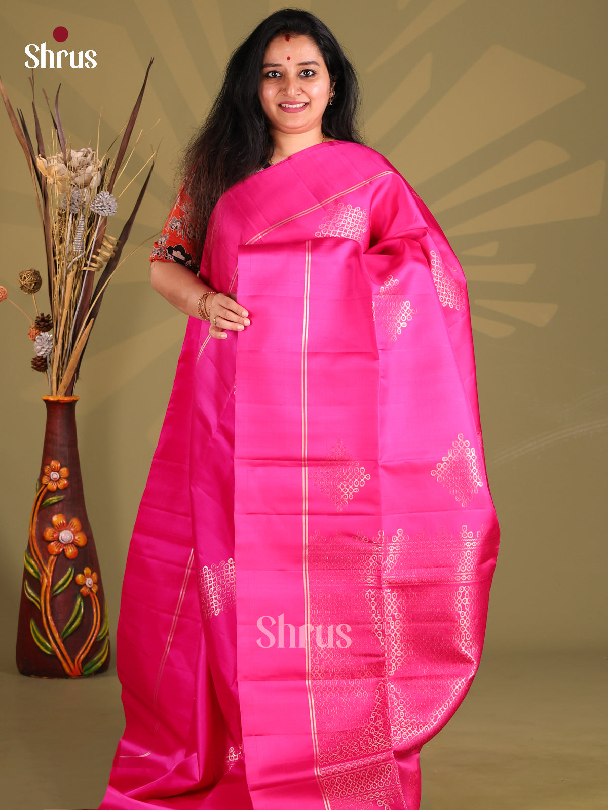 Charming Rani Pink Soft Silk Saree with gold zari kolam motifs