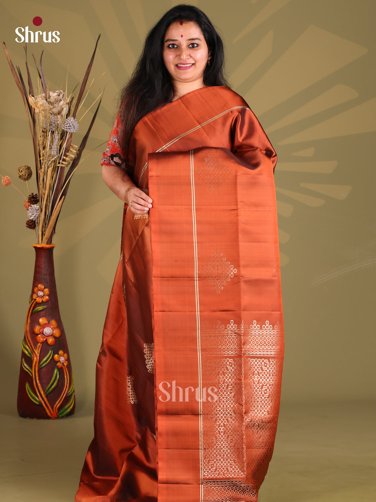 Classy Rust single tone Soft Silk Saree with zari kolam motifs