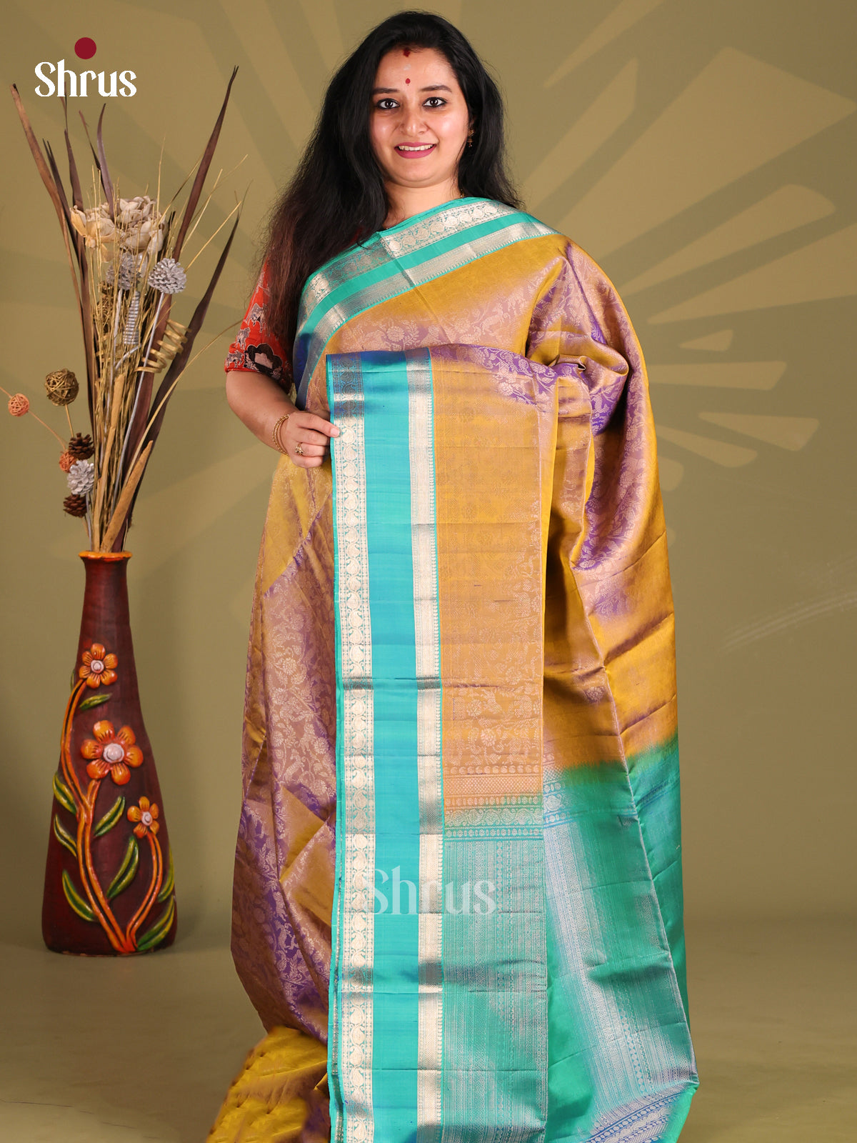 Dazzling Mustard Soft Silk Saree gleams with vanasingaram zari brocade