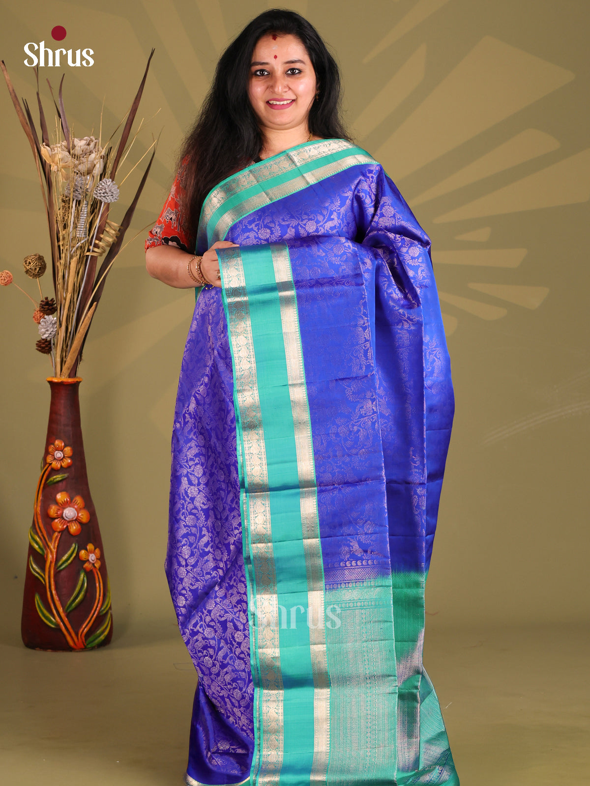 Stunning Blue Soft Silk Saree gleams with vanashingaram zari brocade