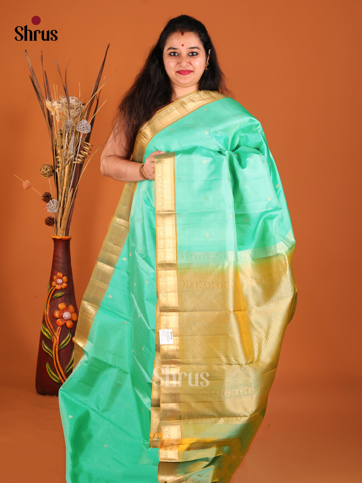 Teal & Mustardy Green Kanchipuram silk Saree with zari buttas-1
