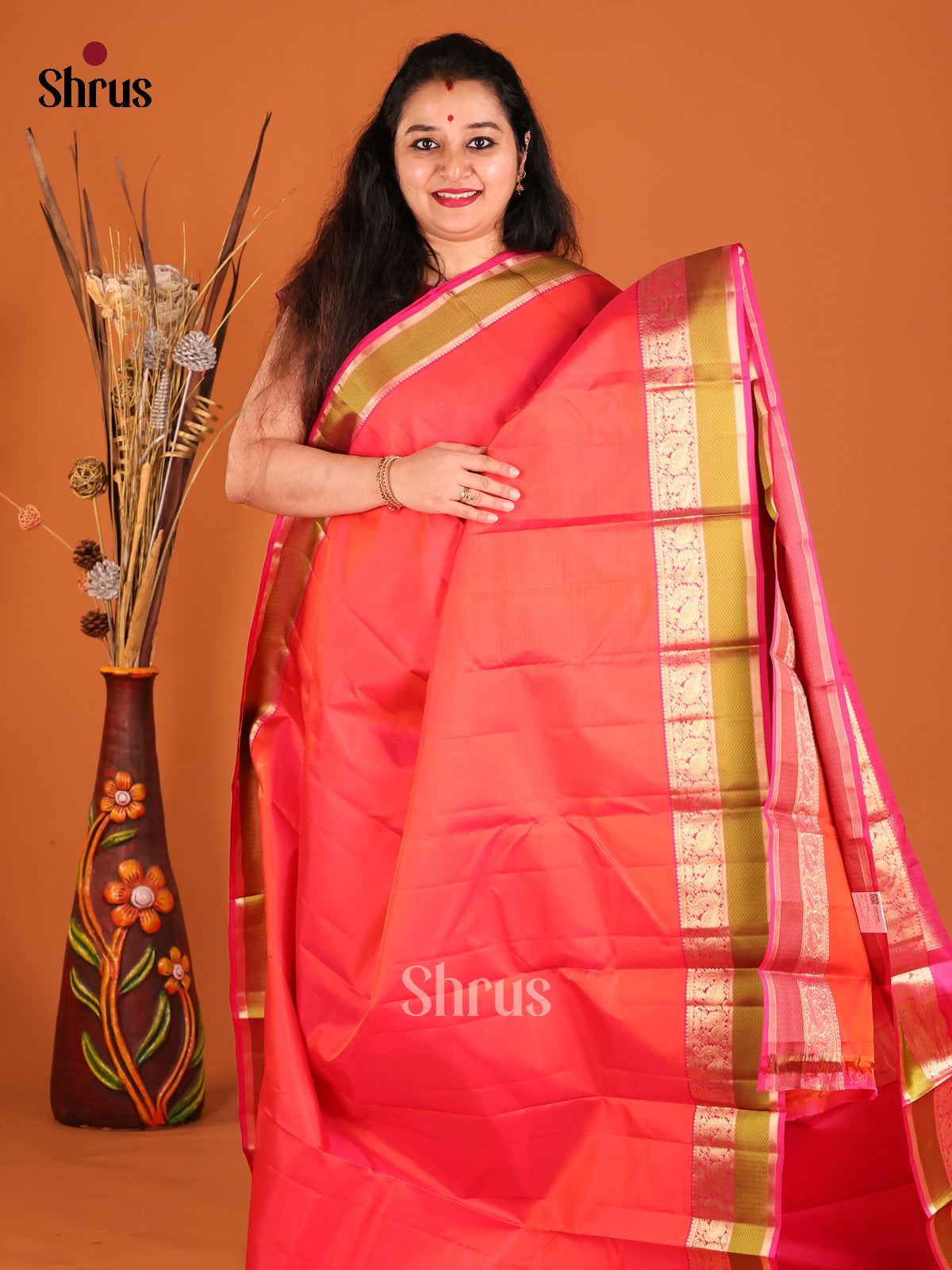 Radiant Orange Kanchipuram silk Sareewith contrast Peacock Vine Border-2