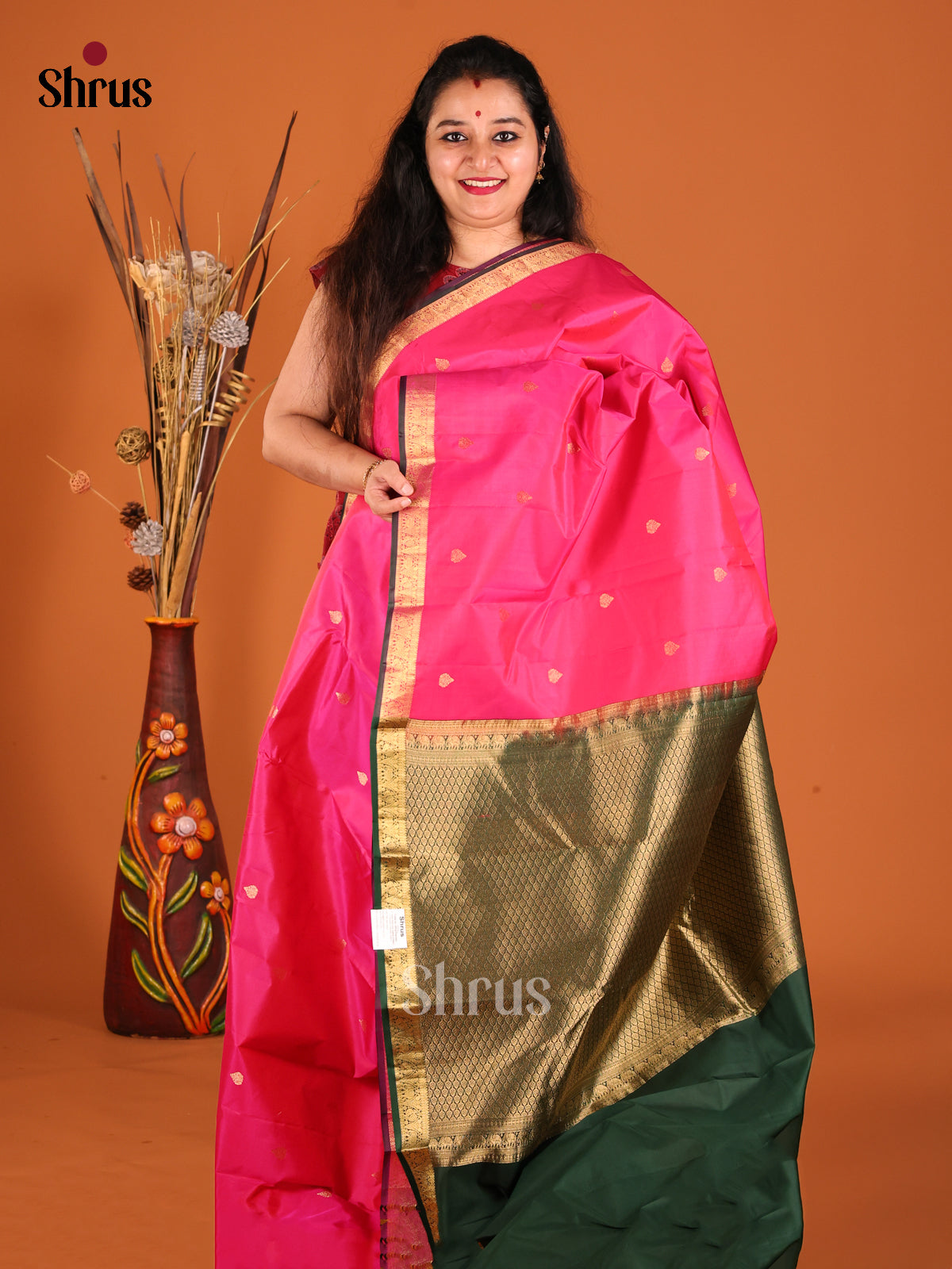 Pink & Green Kanchipuram silk Saree gleams with zari drop buttas-1