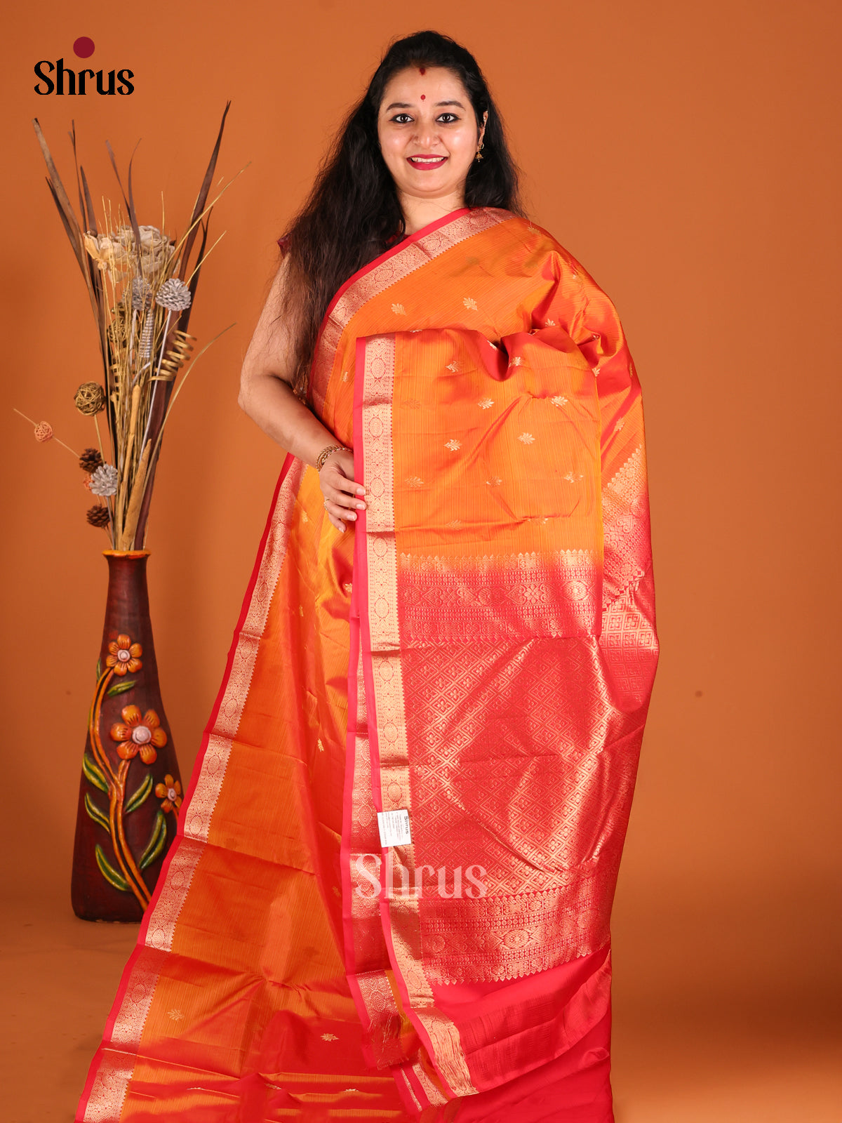 Radiant Orange Kanchipuram silk Saree gleams with gold zari floral buttas-1