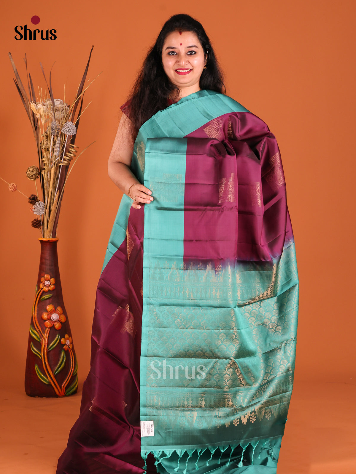 Wine & Teal Softsilk-halfpure Saree with zari block motifs