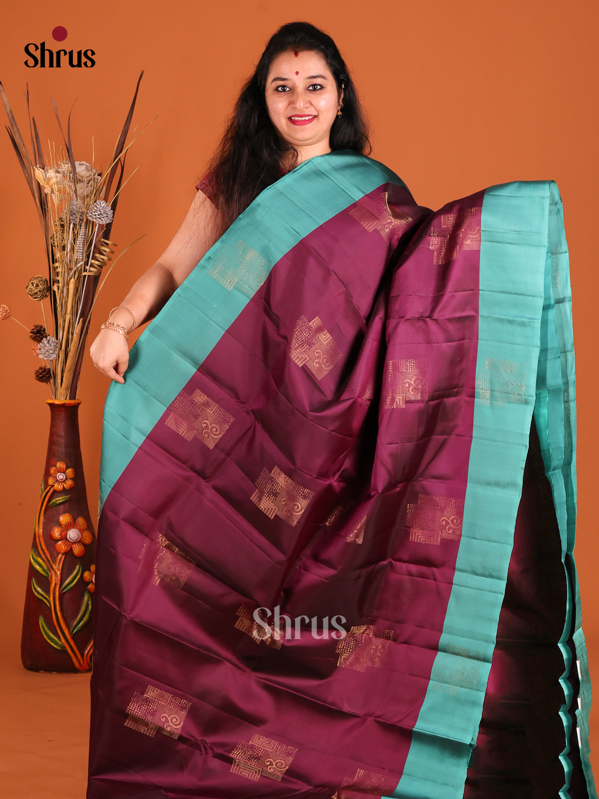 Wine & Teal Softsilk-halfpure Saree with zari block motifs