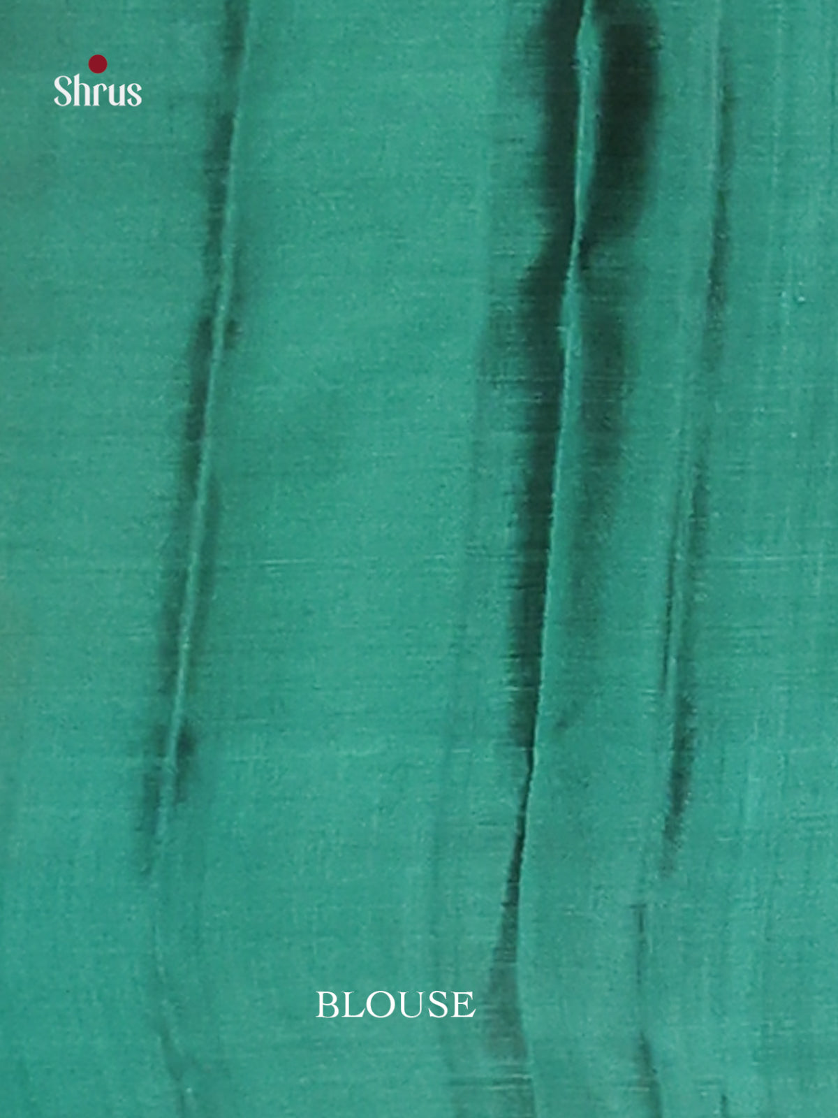 Arakku Maroon & Green Softsilk-halfpure Saree gleams with zari floral motifs