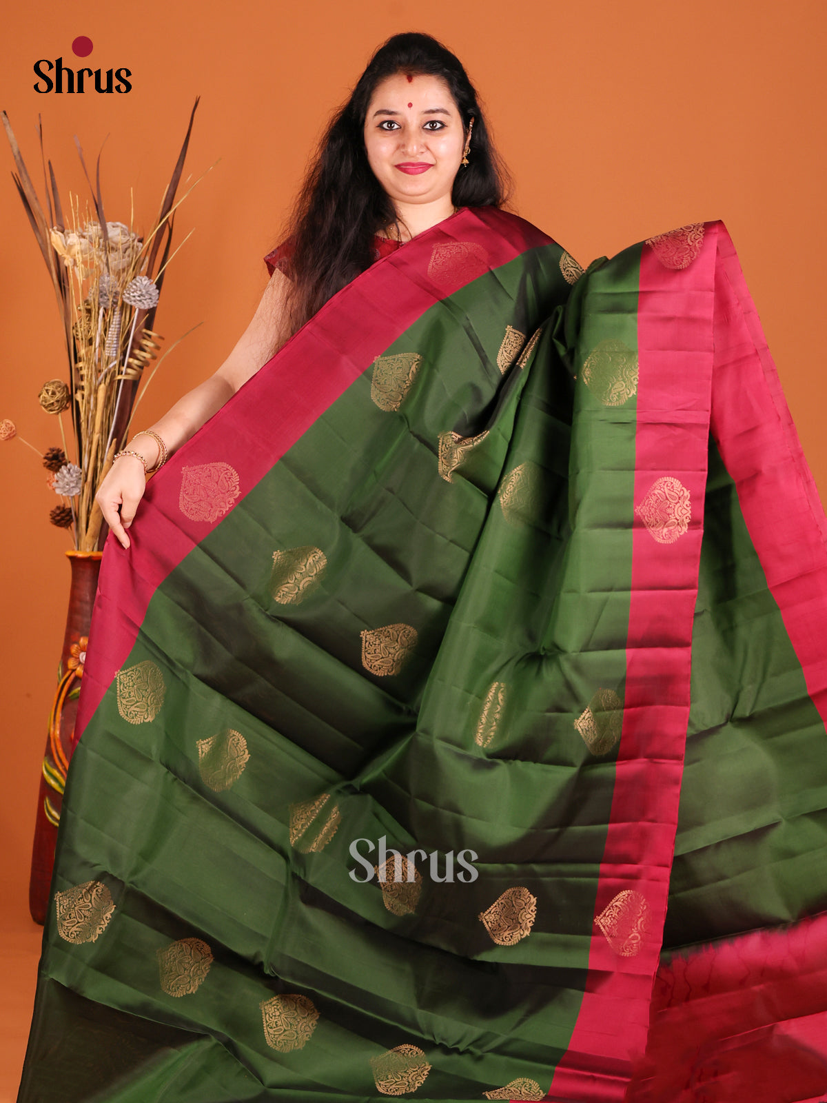 Green & Maroon Softsilk-halfpure Saree with gold zari floral motifs