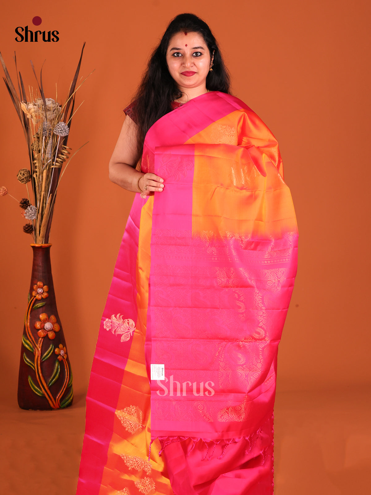 Orange & Pink Softsilk-halfpure Saree gleams with gold zari floral motifs