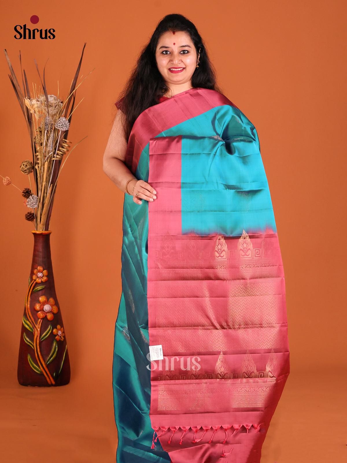 Blue & Maroon Softsilk-halfpure Saree with zari floral motifs