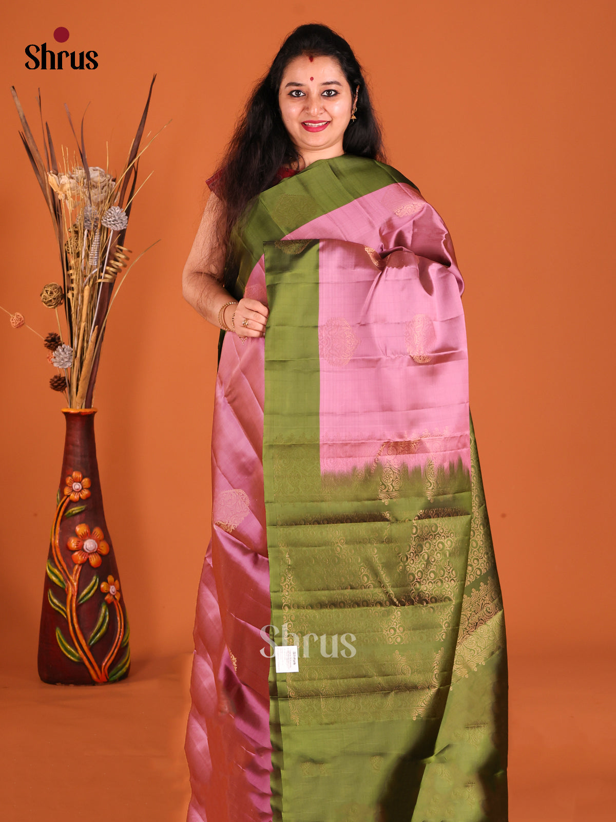 Onion pink and Green Softsilk-halfpure Saree with gold zari floral motifs