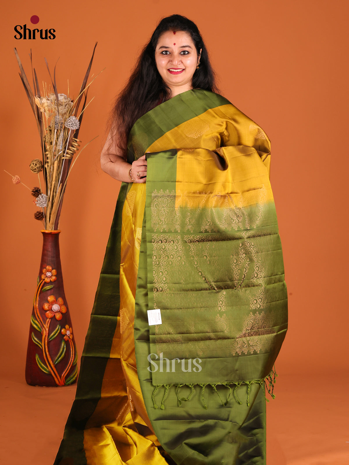 Mustardy Green & Green Softsilk-halfpure Saree with zari floral motifs