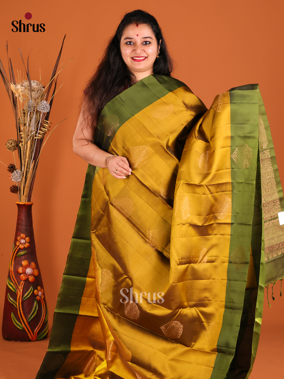 Mustardy Green & Green Softsilk-halfpure Saree with zari floral motifs