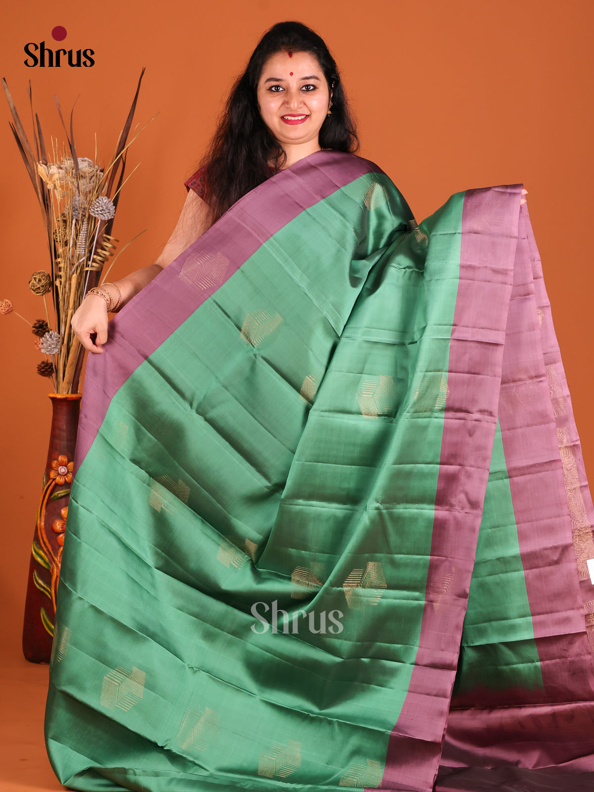 Green & Purple Softsilk-halfpure Saree with zari motifs
