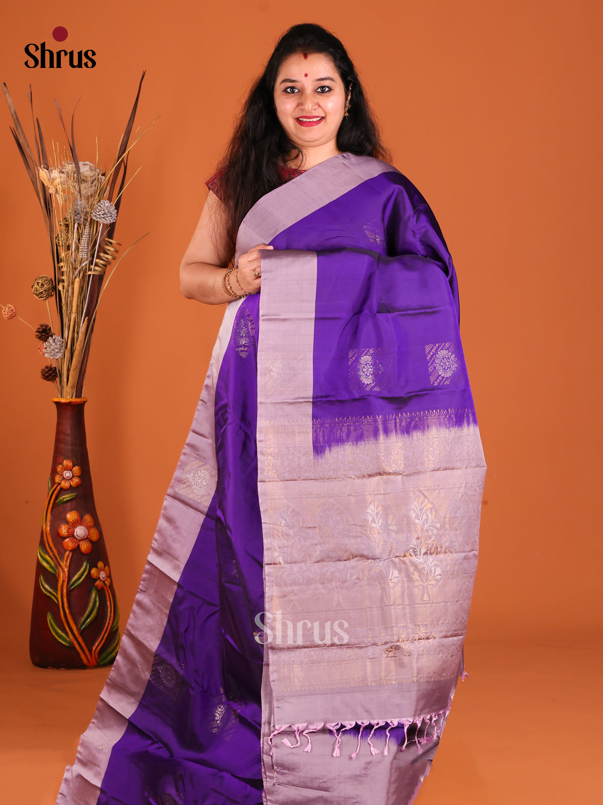 Violet & Lavender Softsilk-halfpure Saree with zari floral motifs