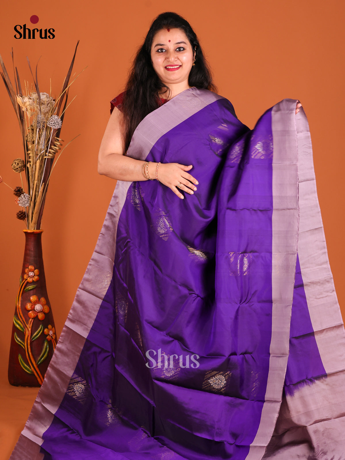Violet & Lavender Softsilk-halfpure Saree with zari floral motifs