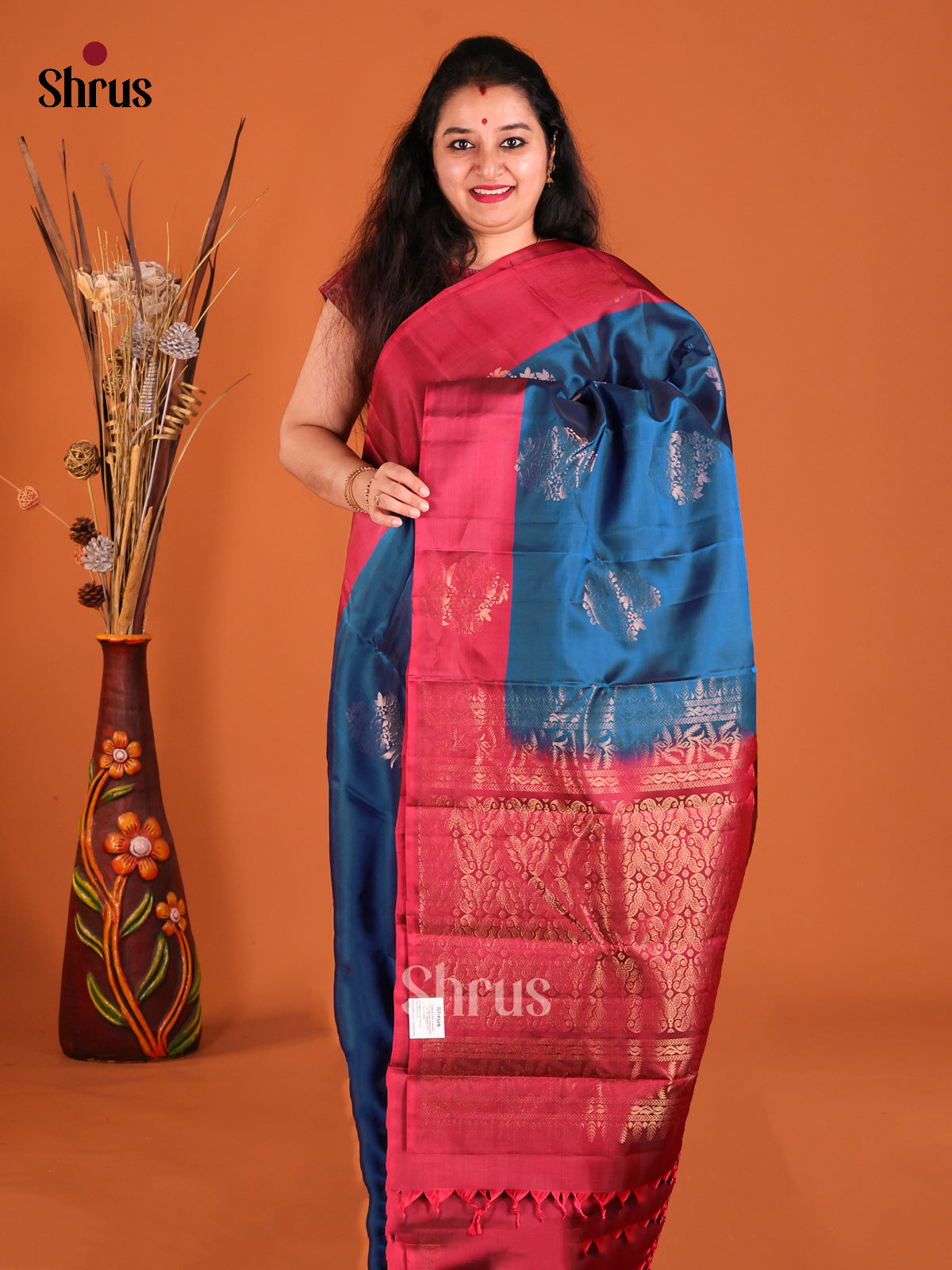 Blue & Maroon Softsilk-halfpure Saree with gold zari floral motifs