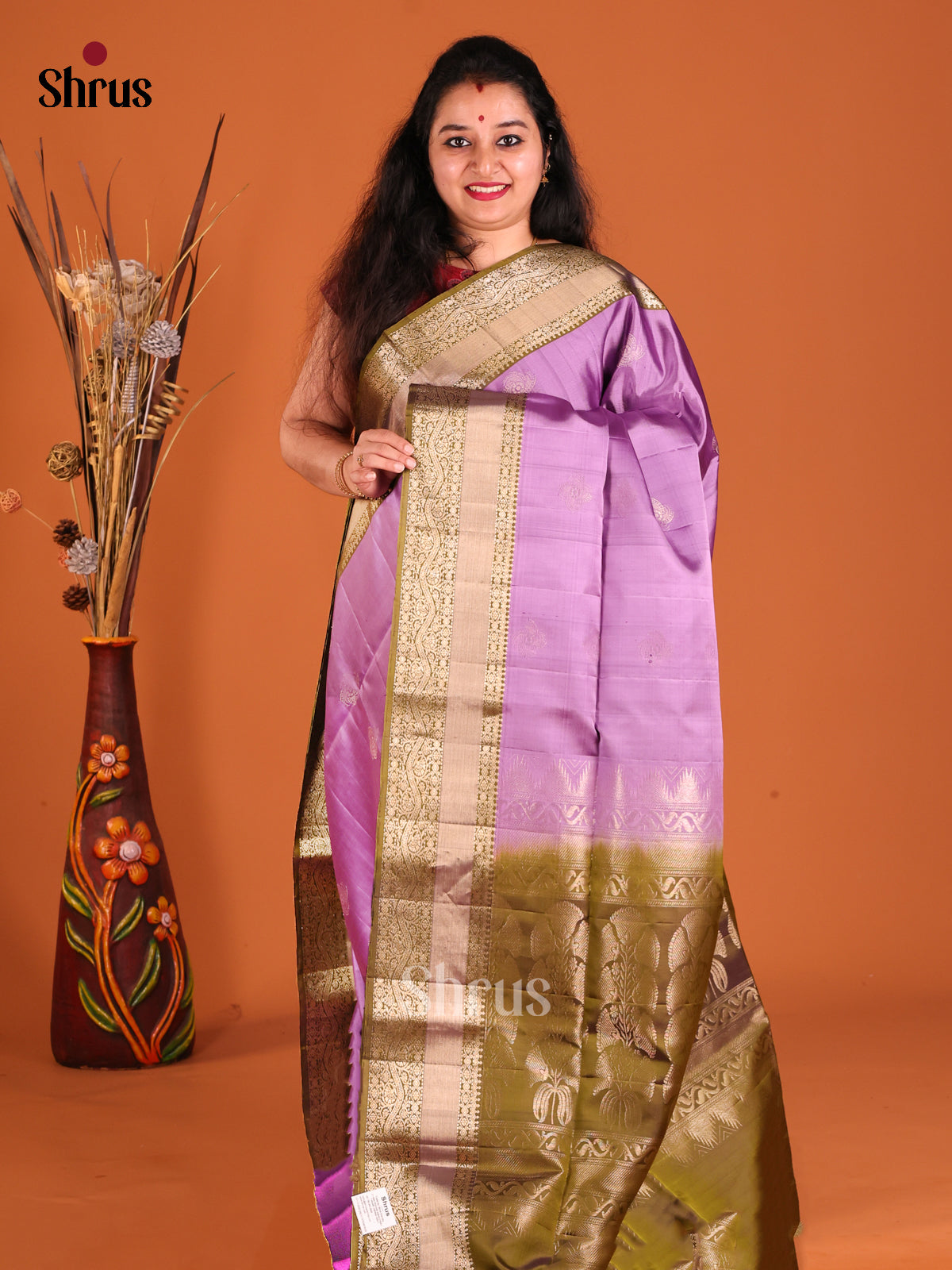 Lavender & Green Soft Silk Saree gleams with zari buttas-1