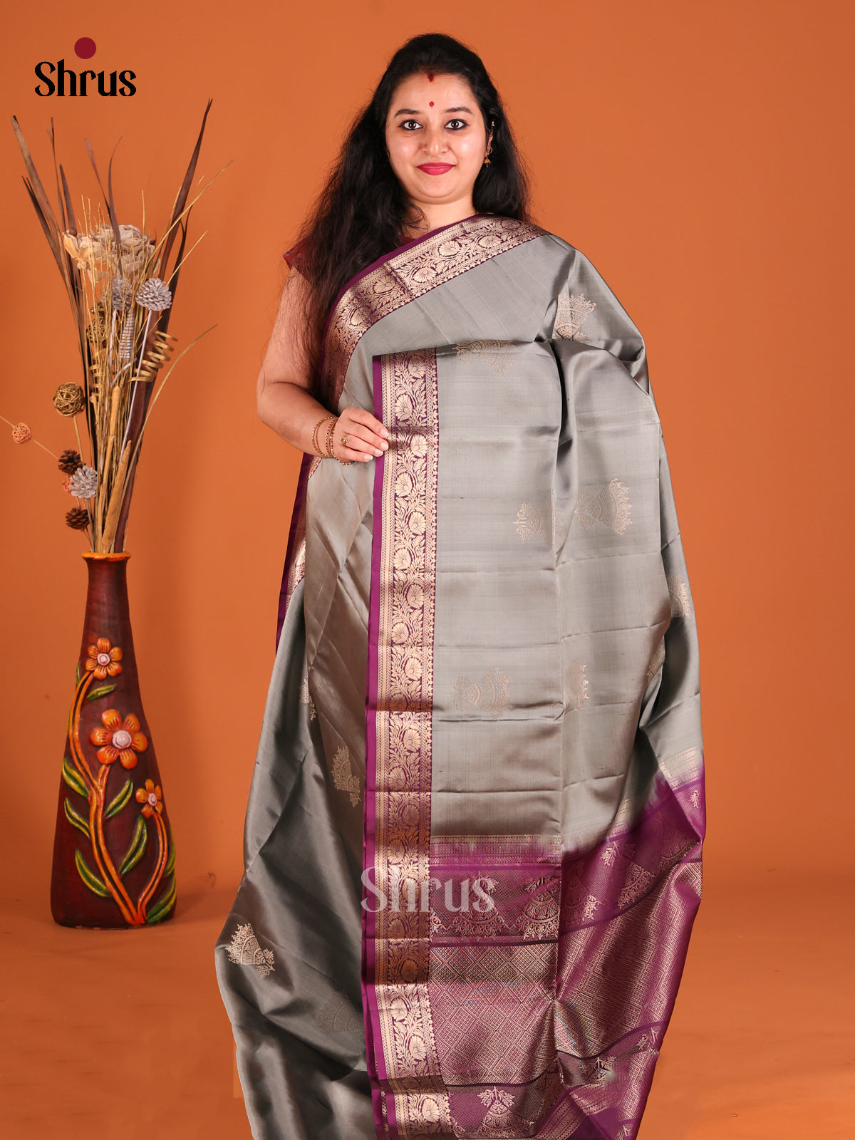 Elegant Grey Soft Silk Saree gleams with gold zari floral motifs-1