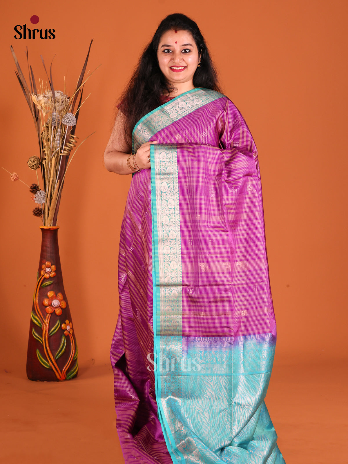 Enchanting Purple Soft Silk Saree gleams with zari stripes, buttas-1