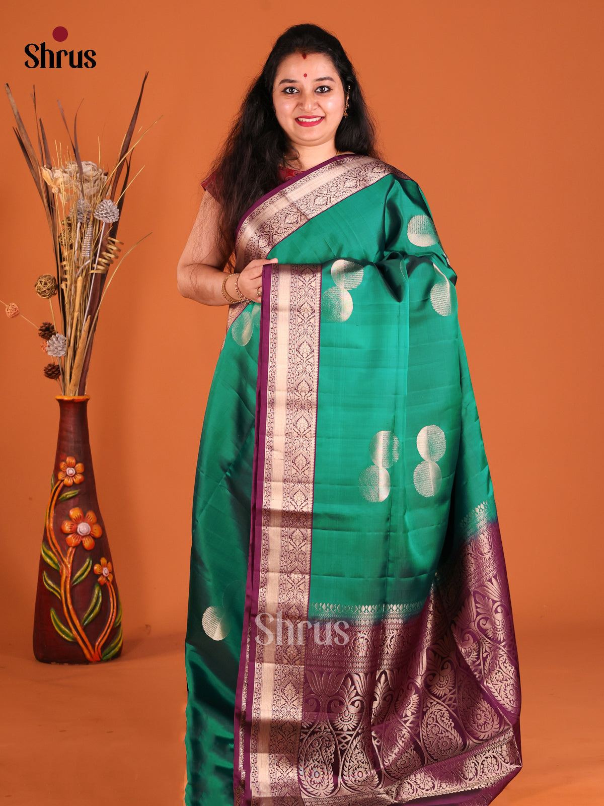 Classic Green Soft Silk Saree with rich contrast floral vines border-1
