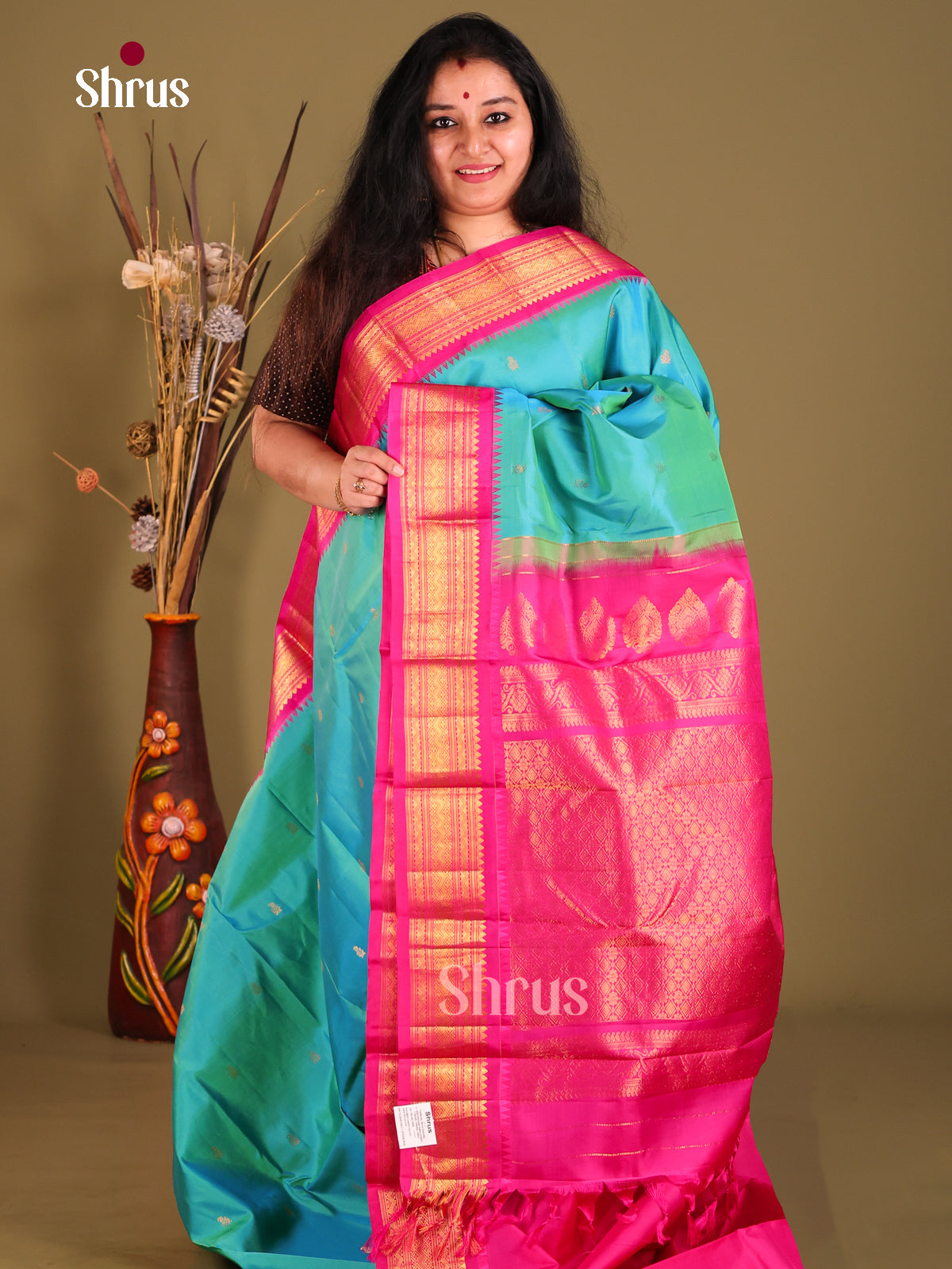 Stunning Teal Blue Gadwal silk Saree with gold buttas & Pink Zari Border