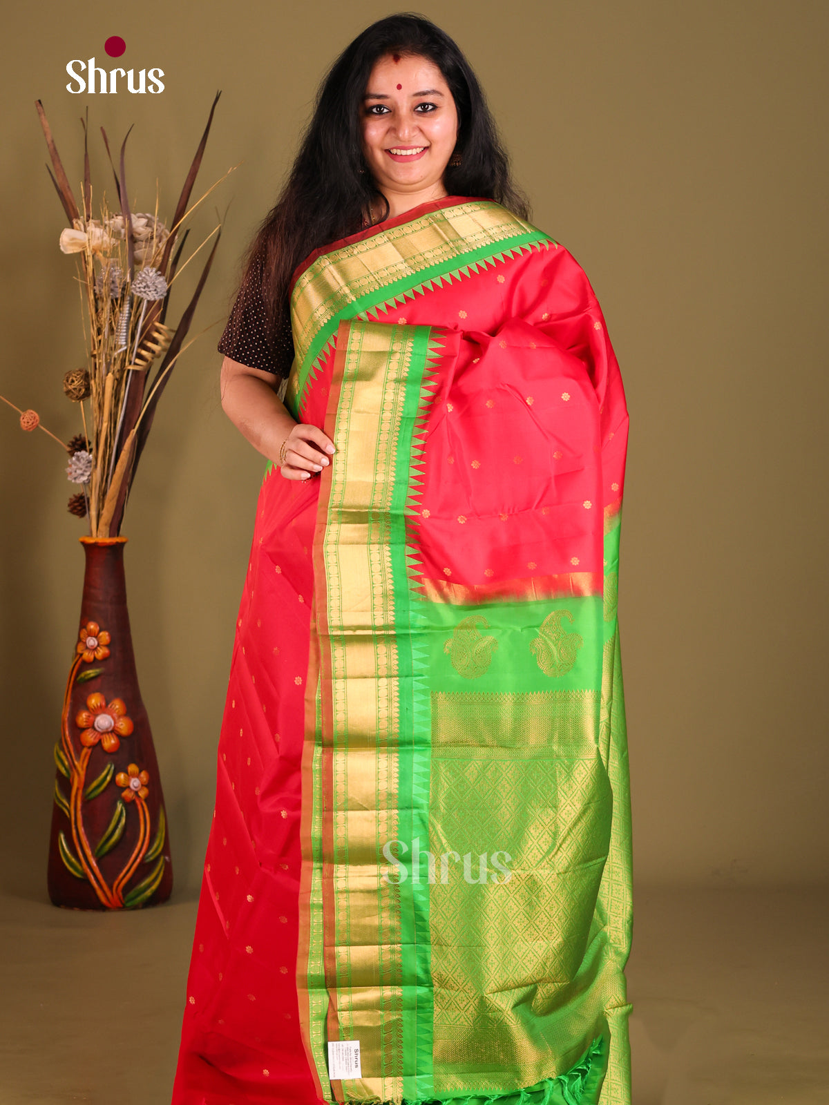 TRaditional Red Gadwal silk Saree with Gold Buttas & Green brocade pallu