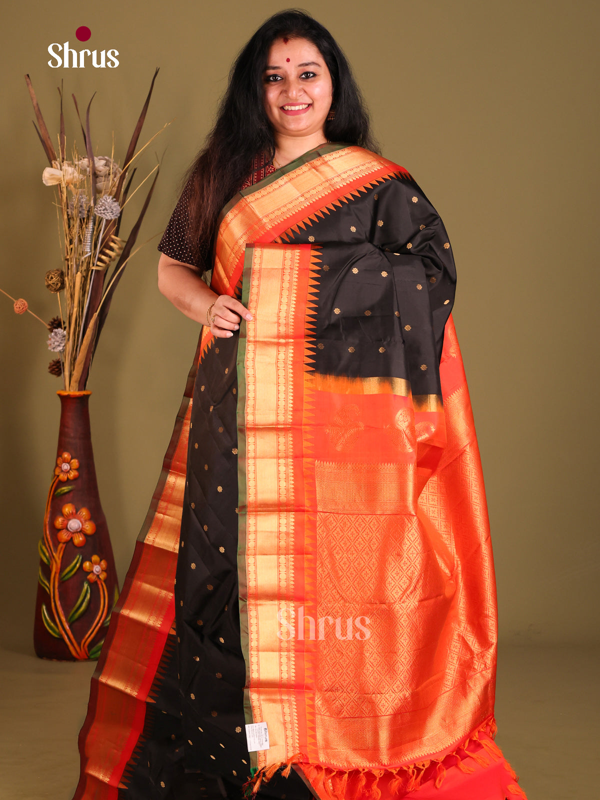 Timeless Black Gadwal Silk Saree with Opulent Orange ZAri Border & Brocade PAllu