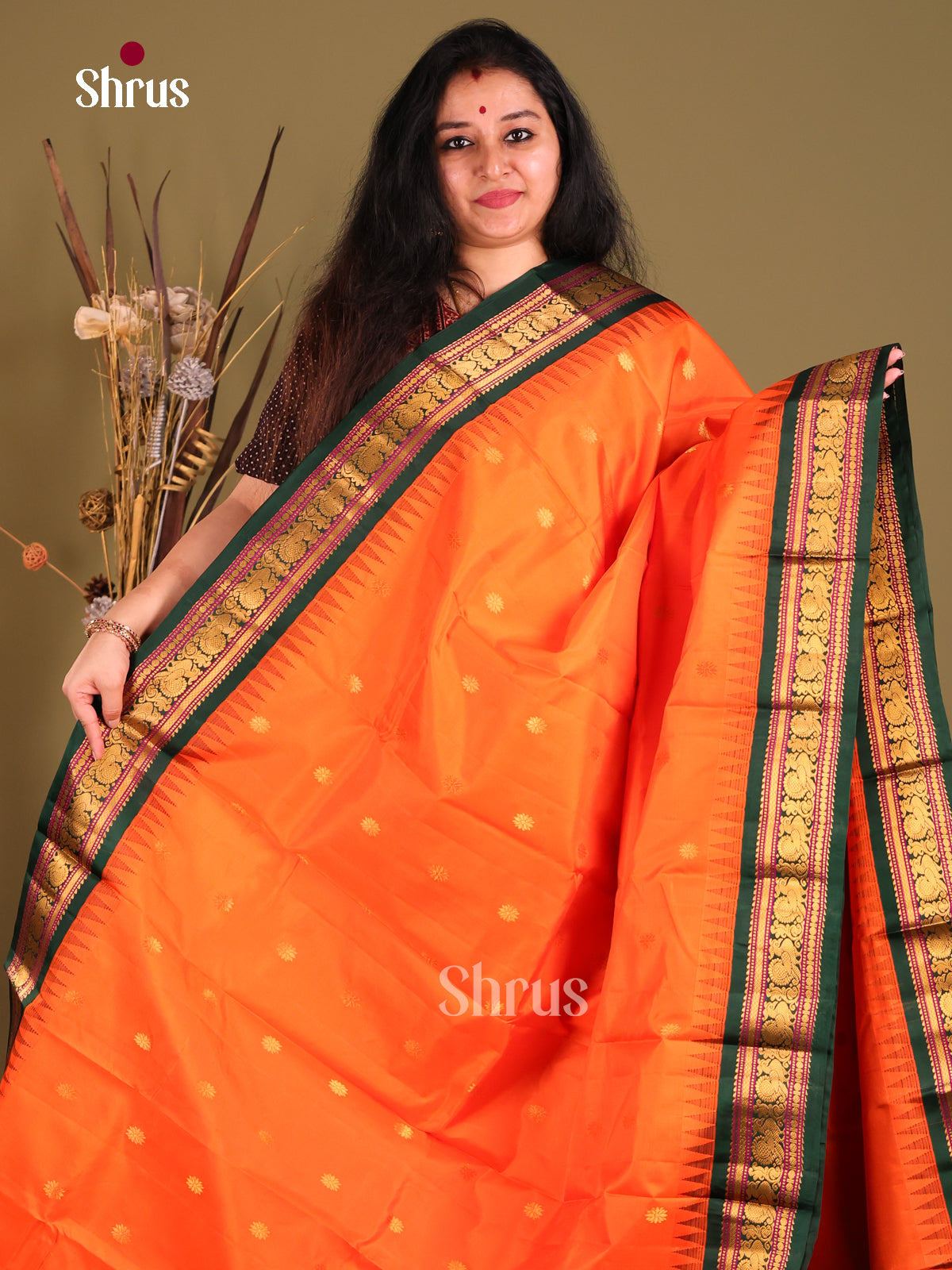 Rediant Orange Gadwal silk Saree with Zari Buttas & rich Green traditional zari border-1