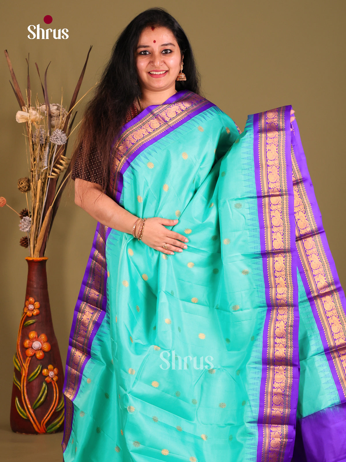 Ornate Teal Gadwal silk Saree with gold zari buttas & Purple Brocade Pallu-1
