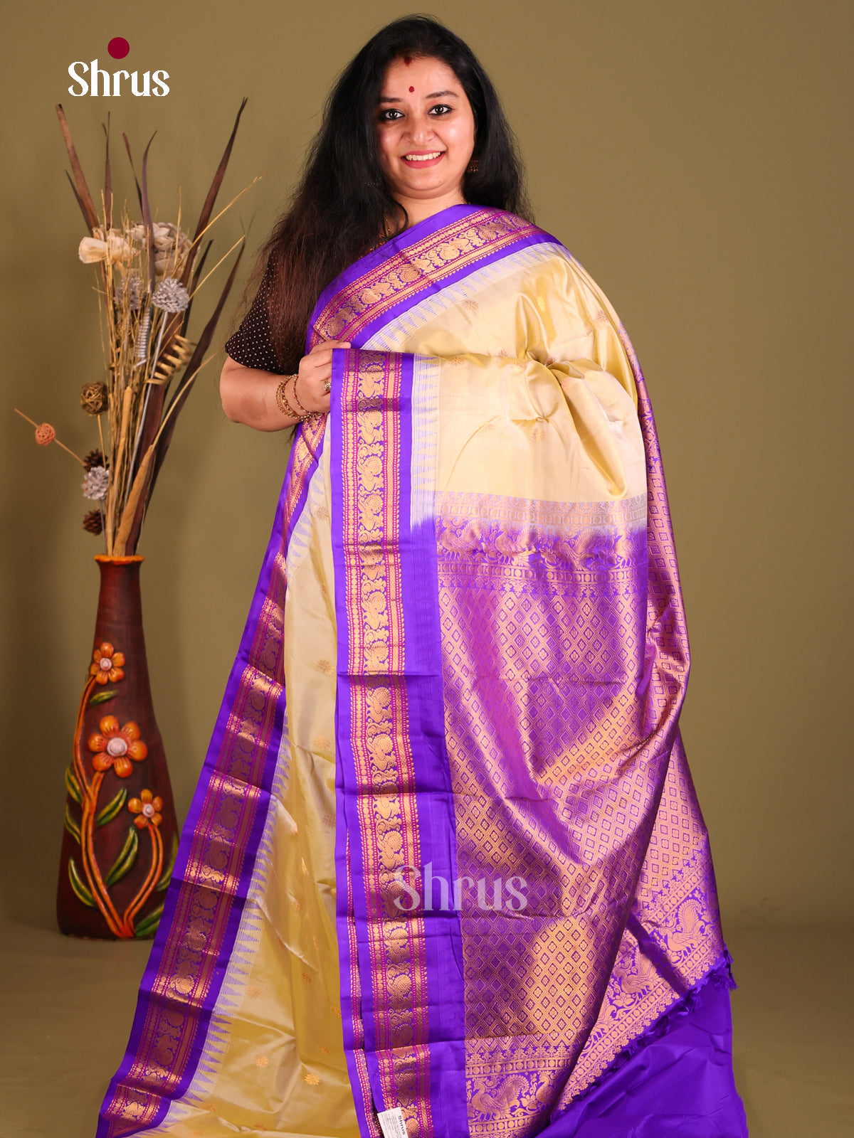 Rich Cream Gadwal silk Saree with Gold Buttas & Purple zari border