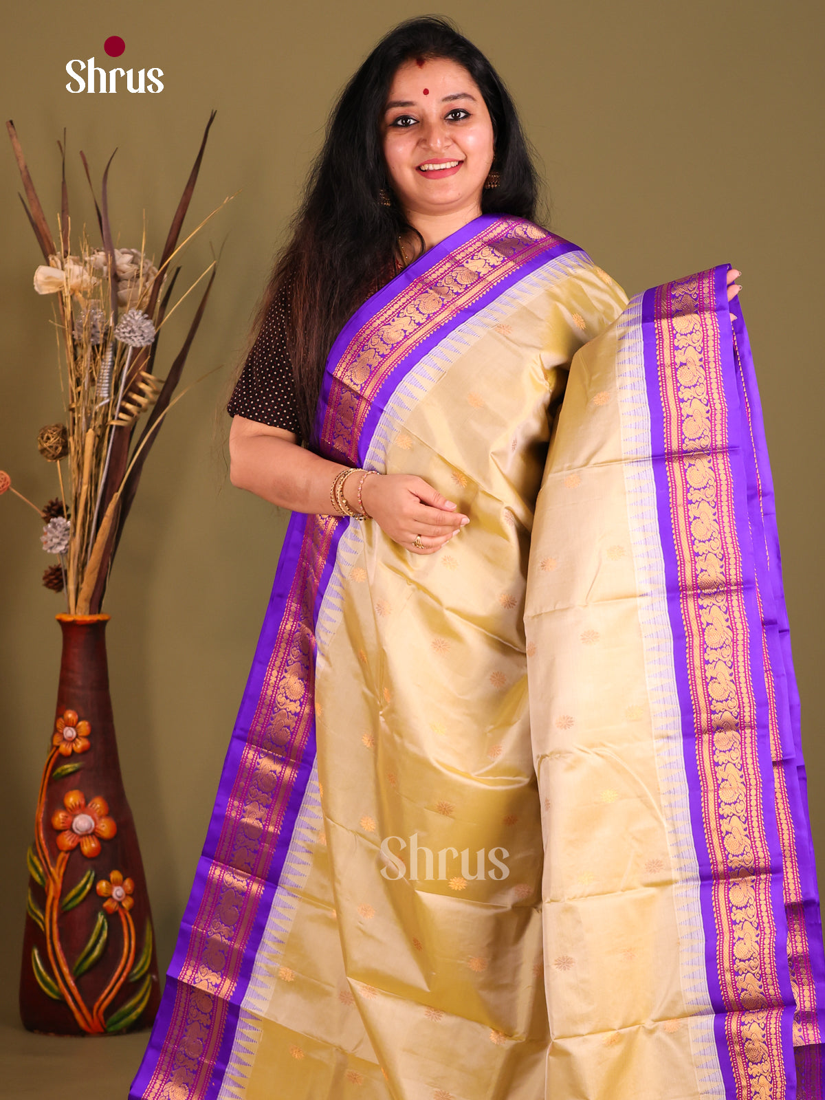 Rich Cream Gadwal silk Saree with Gold Buttas & Purple zari border-1