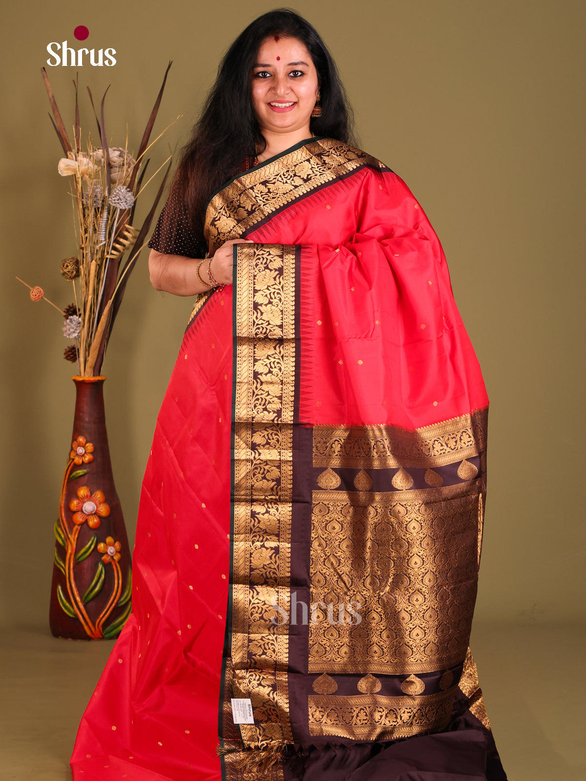 Red gadwal silk saree with brown zari border